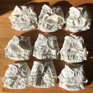 Set of 9 esembly cloth diapers size 1 used